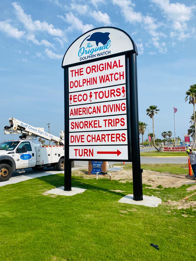Precision-engineered signage for The Original Dolphin Watch, providing clear direction for eco-tours and diving services.
